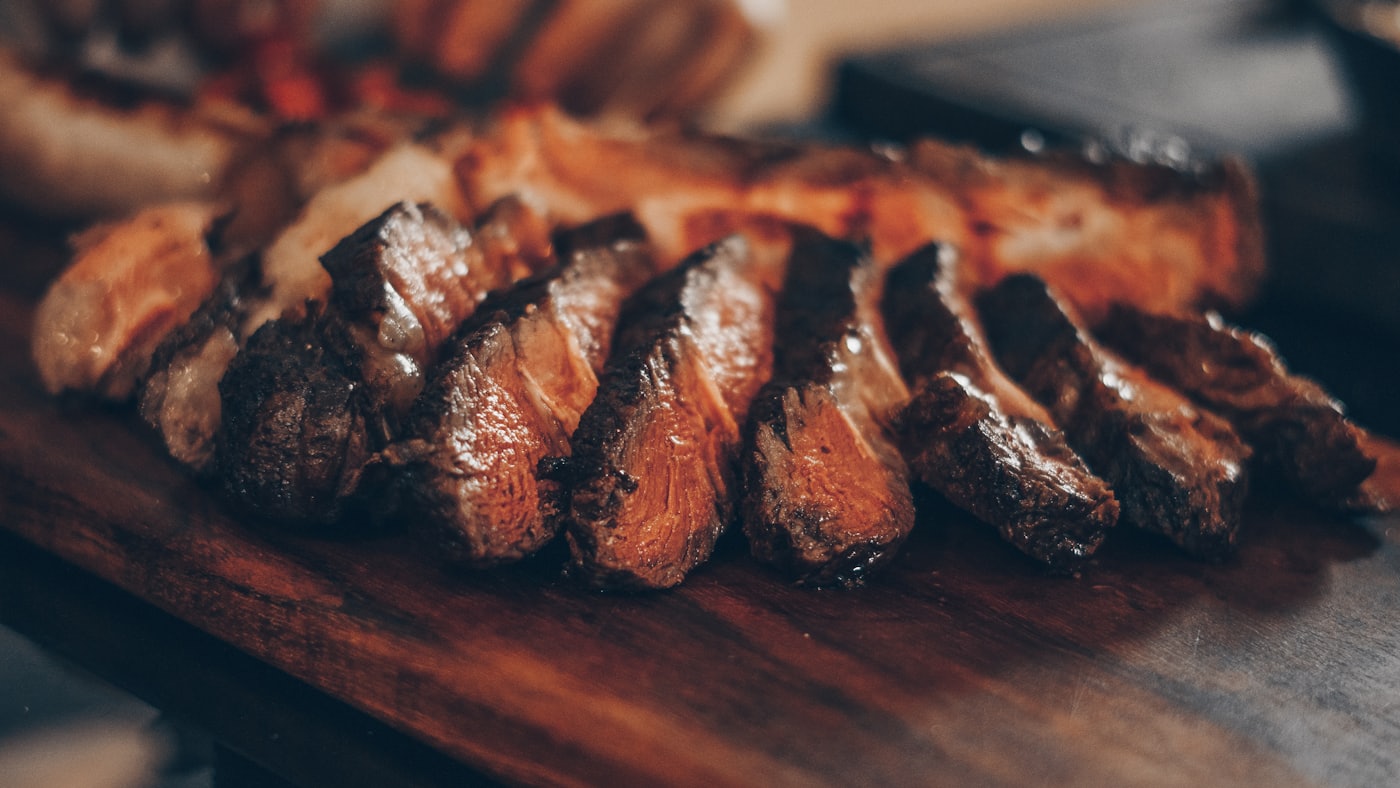 Plated steak with herbs