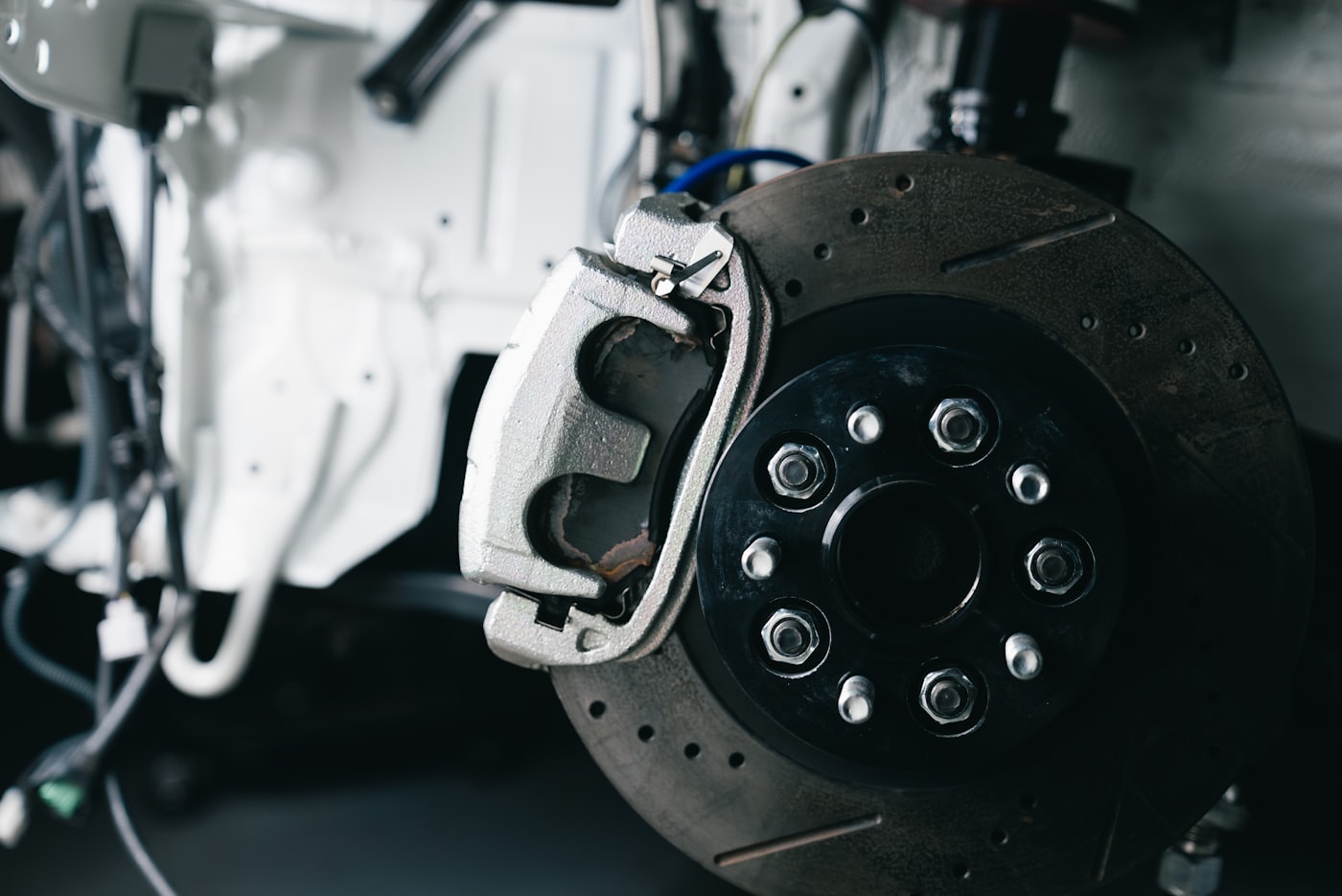 Close-up of a car brake rotor and caliper